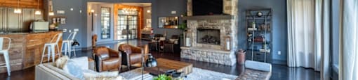 A living room with a fireplace and a couch.