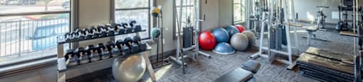 A well-equipped gym with a variety of exercise equipment.