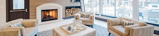 A living room with a fireplace and a couch.
