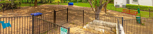 A fenced area with a sign that says "BET PARK".