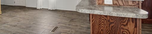 view of counter top/kitchen and living room at Forest Vista, La Porte, Texas