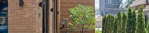The image shows the front of a building with the number 2845 on it.