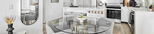 A modern kitchen with a glass table and grey chairs.