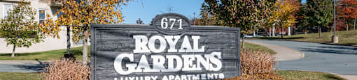 the sign at royal gardens luxury apartment building