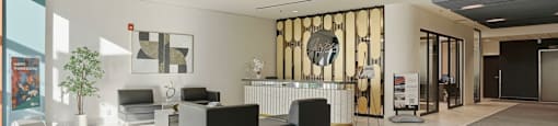 A spacious lobby with a reception desk and a large mirror on the wall.