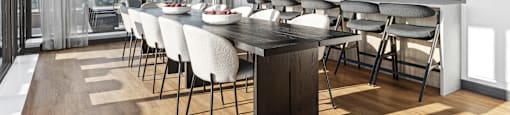 a kitchen with a large island and a table with chairs