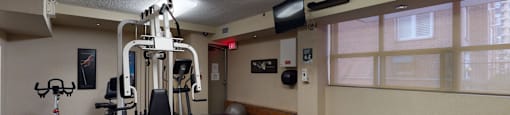 Fitness room with weights, workout mats