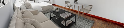 a living room with a couch and a table and a tv