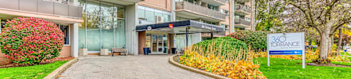 the entrance to an apartment building with a sign that reads welcome to brookdale