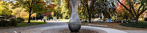 a fountain in the middle of a park