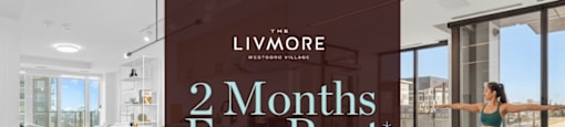 A woman is doing yoga in a spacious room with a sign that reads "2 Months Free Rent".