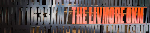 A wall of letters spelling out "The Livmore OK" in orange.