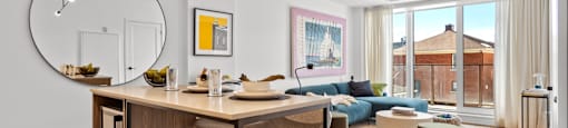 a living room with a bar with two stools