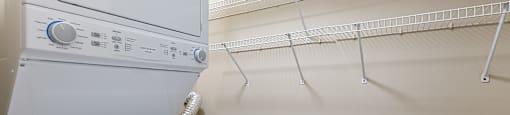 A white dryer is on the left and a white washer is on the right.