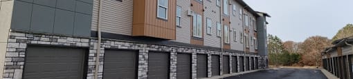 a building with a row of garage doors