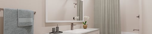 a bathroom with a sink and a toilet and a mirror