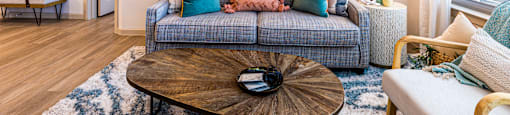 Living room with a couch and a coffee table at The Parker Austin, Pflugerville