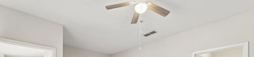 an empty bedroom with a ceiling fan and a closet