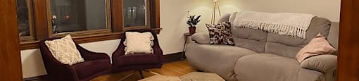 a living room with a couch and a table
