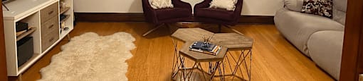 a living room with a couch and a table