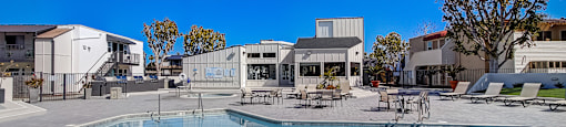take a dip in the swimming pool at the enclave at woodbridge apartments in sugar land,