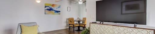 our apartments have a living room and dining room with a flat screen tv