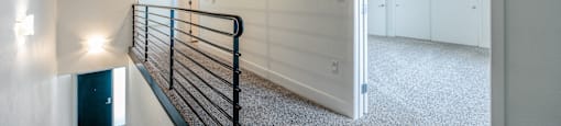 a view of the top of a staircase in a new home