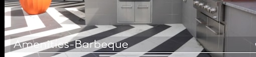 A modern kitchen with a black and white checkered floor.