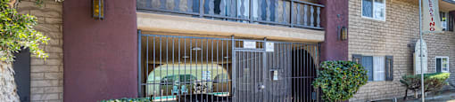 a building with a gate in front of it