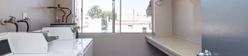 this is a photo of the laundry room in a 1 bedroom apartment at deer hill apartments in