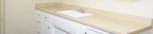 Kitchens with cabinets in Martin apartments