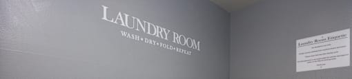 a laundry room with a washer and dryer