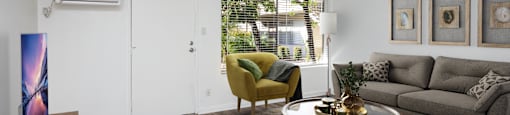 a living room with a couch and a coffee table
