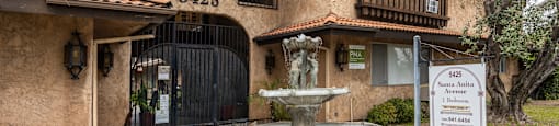 a fountain in front of a building