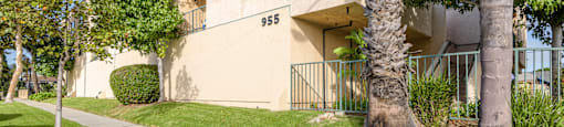 an apartment building with the address 385 on the side of the building