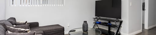 a living room with a couch and a coffee table