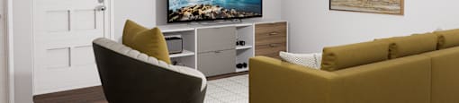 a living room with a couch and a television on the wall