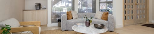 a living room with a couch and a coffee table