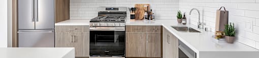 a kitchen with a refrigerator and a counter top