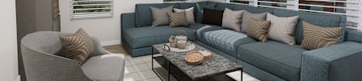 a living room with a blue couch and a coffee table