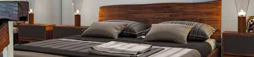 a bedroom with a bed and a rug
