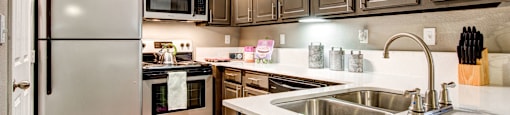 updated kitchen with stainless steel appliances
