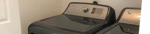 Apartments for Rent in Walnut Creek - Ivy Hill - An interior shot of the in-unit full size washer/dryer