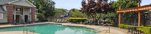 our apartments have a resort style pool with chairs