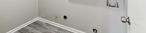 A white door is on the right side of the image.