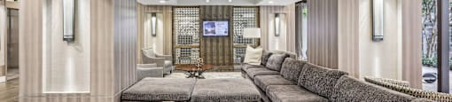 a living room with couches and a table