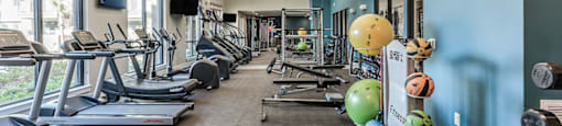 gym at soneto on western apartments