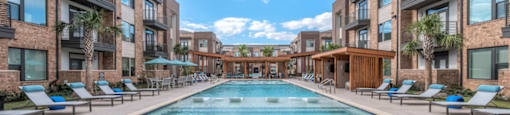 outdoor pool area at soneto on western apartments