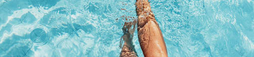 Person in pool,  The Can Plant,  Luxury Apartments in San Antonio