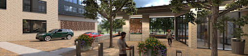 A woman is walking in front of a building with a green car parked on the sidewalk.